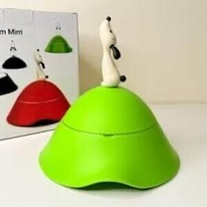 Di Alessi green designer Dog bowl with puppy dog 
handle lid